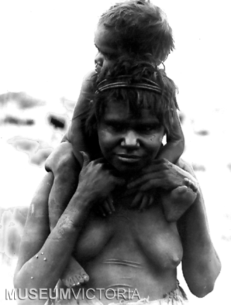 Arrente Woman carrying child - Alice Springs, 1894